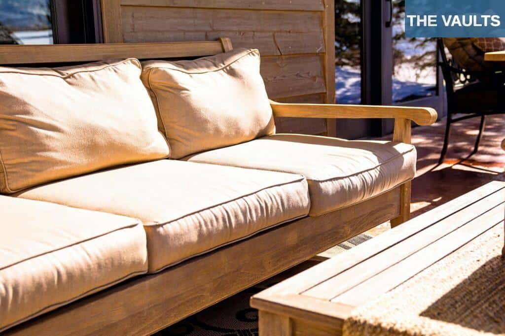 Brown Wooden Futon Placed Near Coffee Table